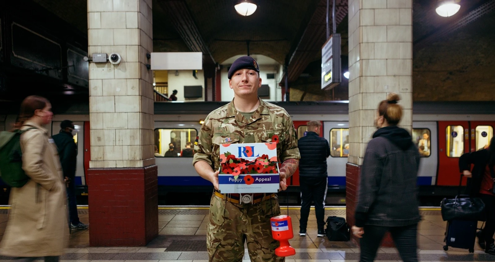 Soldier selling poppies